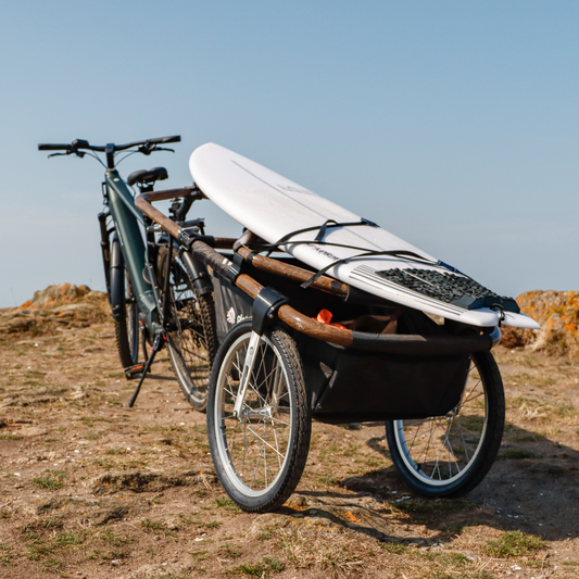 Pack Sports Outdoor - La remorque de vélo Maïna et son rack à planches